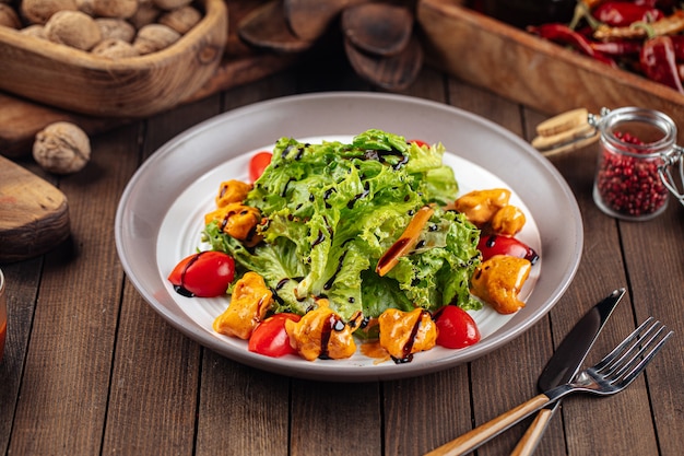 Photo salad with lettuce and fried chicken