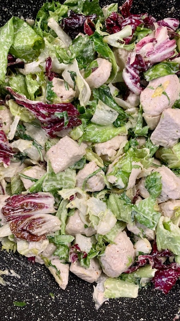 Salad with pieces of turkey in mayonnaise sauce