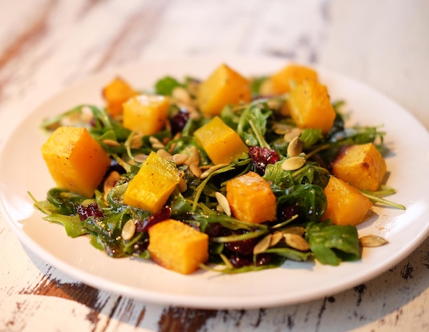 Salad with pumpkin pumpkin seeds and arugula