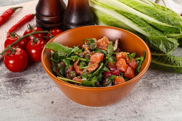 Salad with salmon and arugula