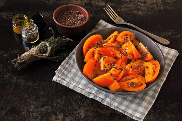 Salad with yellow tomatoes, thyme and seeds.