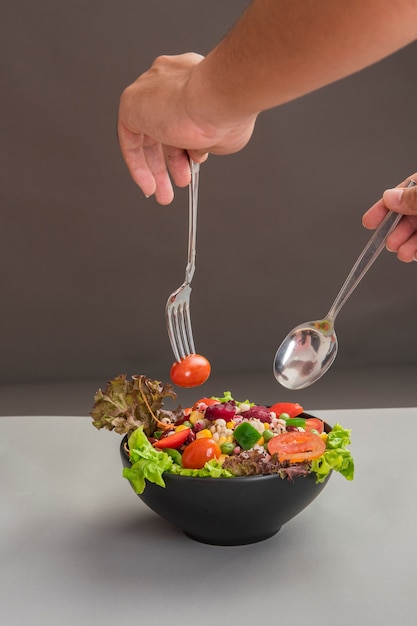 Salad on wood table, Healthy food concept 