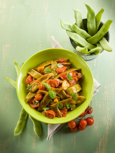 Salade met platte sperziebonen en tomaten