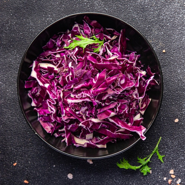 Foto salade paarse kool groenteschotel maaltijd eten snack op tafel kopie ruimte voedsel achtergrond rustiek