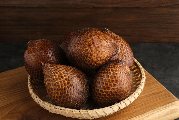 Salak or thorny palm or snake fruit Salacca zalacca is a species of palm tree Selected focus