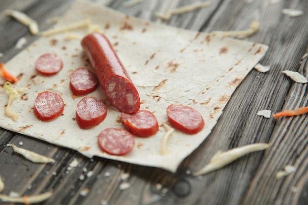 Salami sliced on pita breadpreparation of shawarma photo with copy space