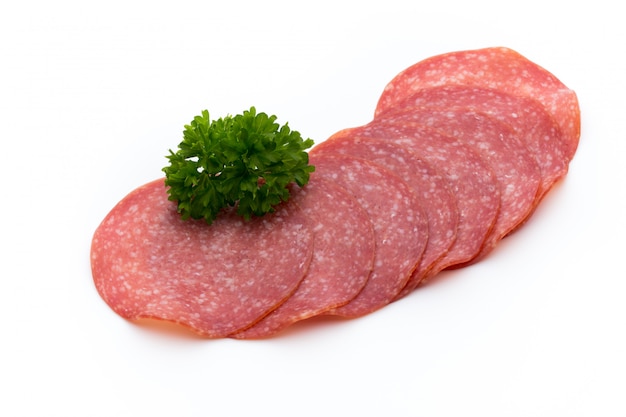 Salami slices isolated on white background