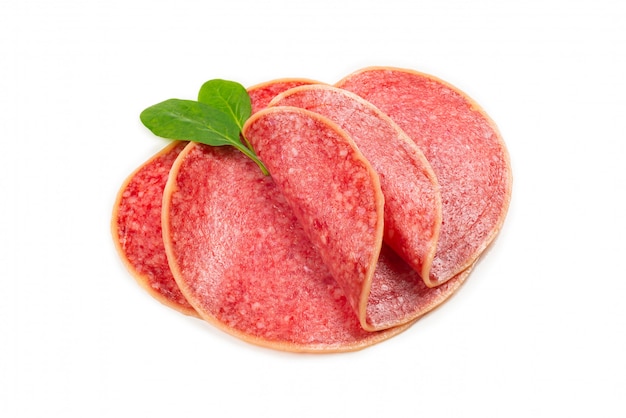 Salami slices isolated on white