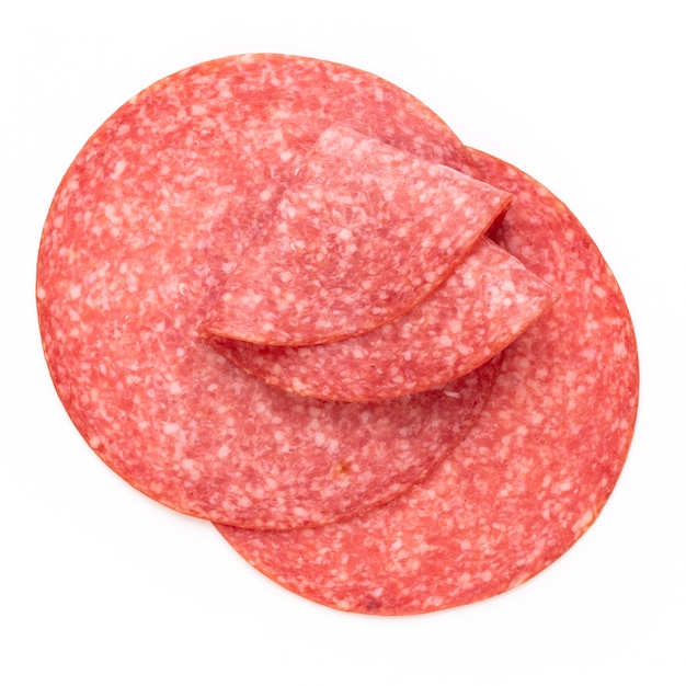 Salami slices on white.