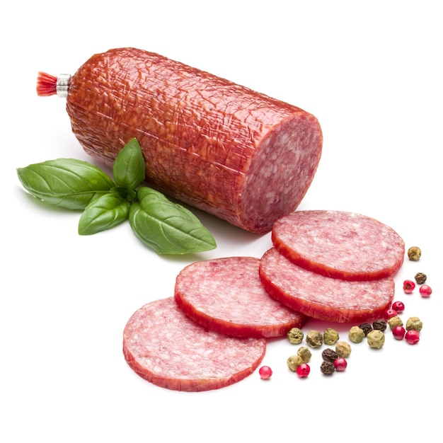 Salami smoked sausage basil leaves and peppercorns isolated on white background cutout