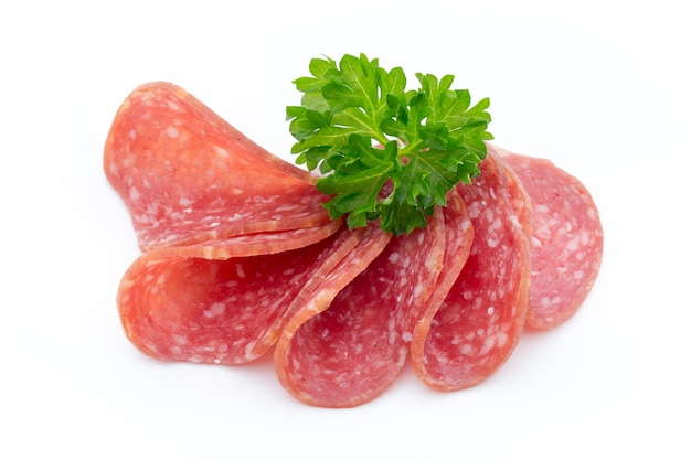 Salami smoked sausages slices isolated on white background.