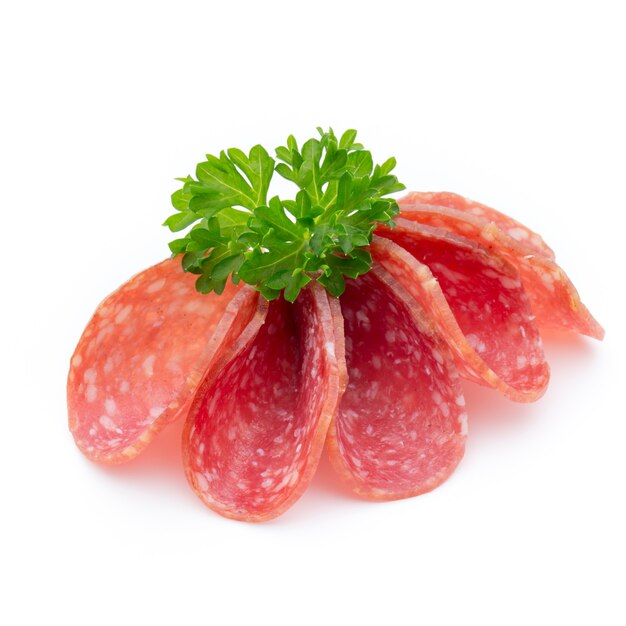 Salami smoked sausages slices isolated on white.