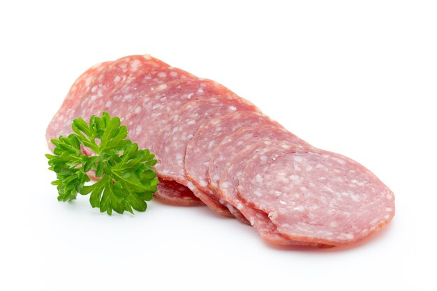 Salami smoked sausages slices isolated.