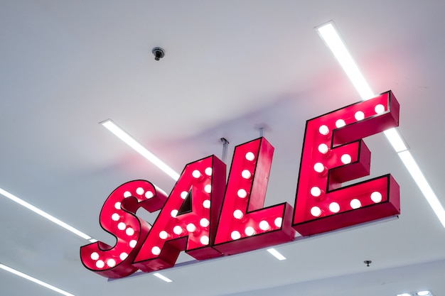 SALE Lightbox hanging in the department store - Sale signage