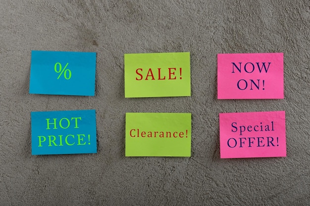 Photo sale tags many sticky note with text sale hot price now on special offer clearance and discount