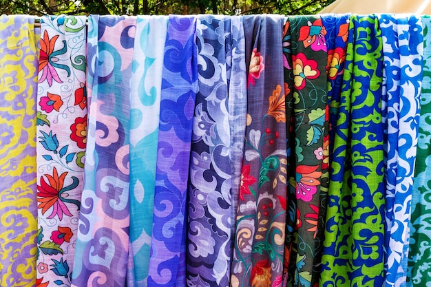 Sale of women039s colorful kerchiefs at a street fair