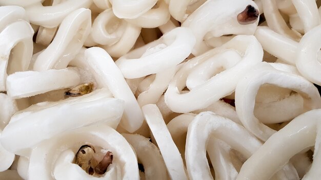 Sales of fresh squid in the market. Frozen seafood.