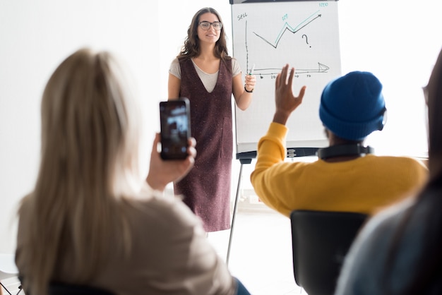 Photo sales manager holding seminar for students