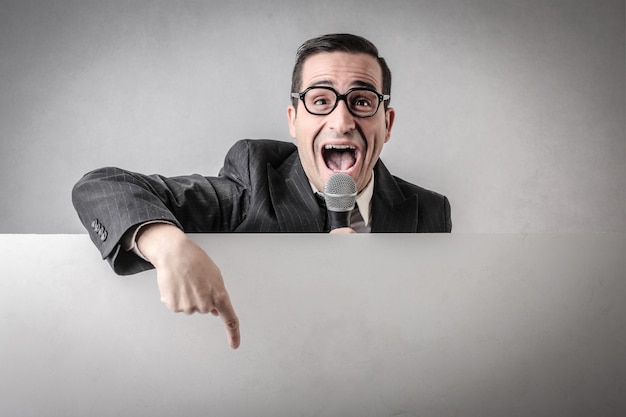 Salesman speaking into a microphone