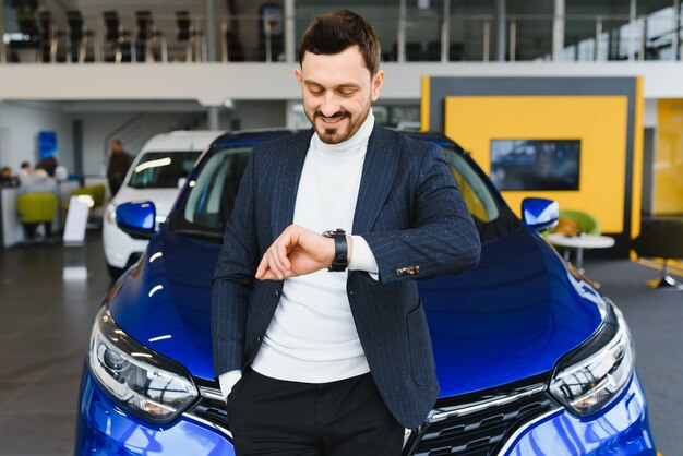 Salesman Stands Near Brand New Car