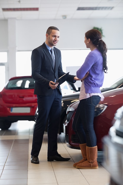 Salesman talking to a customer