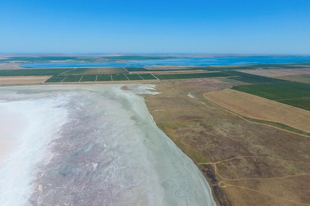 Saline salt lake in the azov sea coast former estuary view from above dry lake view of the salt lake with a birds eye view