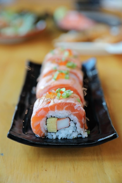 Salmon egg on sushi nigiri roll