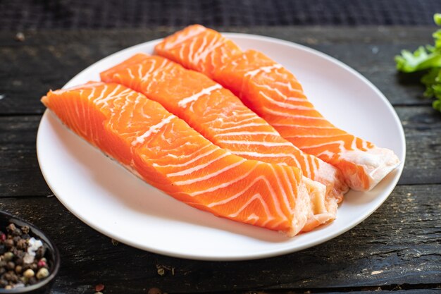 Salmon fish red raw seafood pescetarian diet meal snack copy space food background diet vegetarian