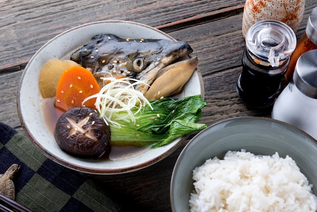 Photo salmon head in soya soup.