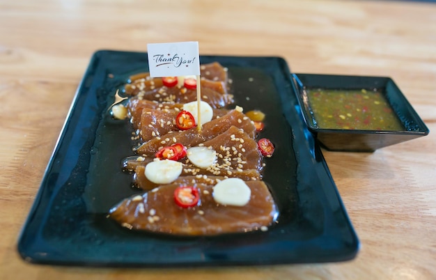 Photo salmon marinated shoyu or salmon pickled soy sauce in korean style.