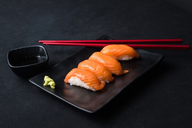 Salmon nigiri sushi and wasabi  Traditional Japanese food style.