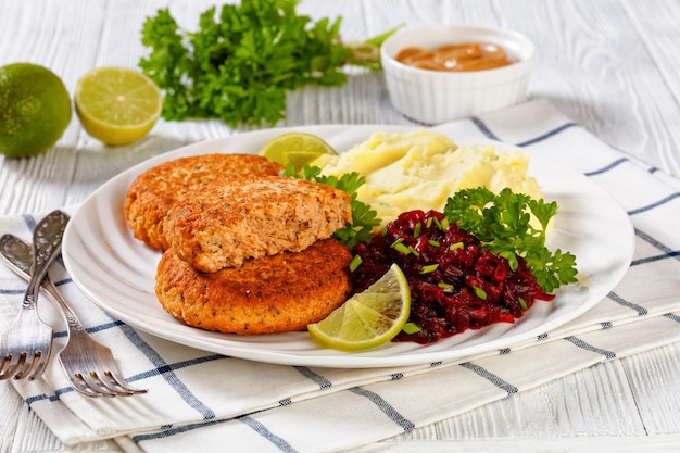 Salmon patty with potato mash and beetroot salad