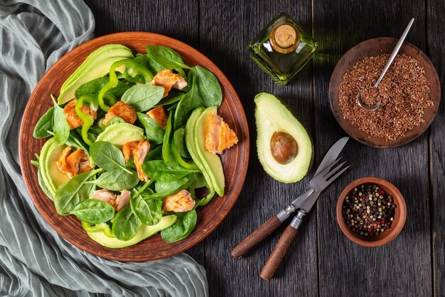 Salmon spinach avocado and green pepper salad