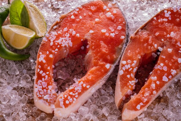 Salmon steak raw in ice.