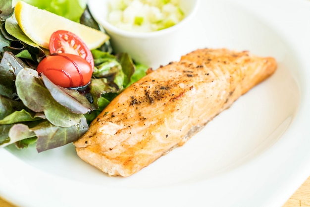 salmon steak with salad