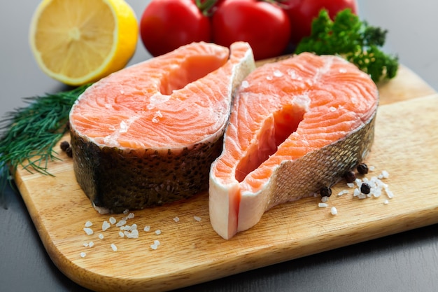 Salmon steaks with salt and pepper