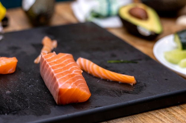 Salmon taco on the cutting table of a professional sushi chef