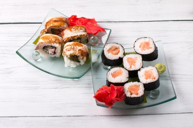 Salmon and tuna rolls. Vegetarian products and fish and rice, sea cabbage