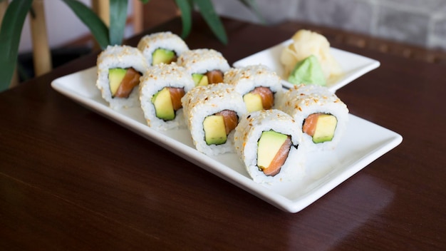 Salmon uramaki. The outer layer is sushi rice and the inner layer is nori seaweed.