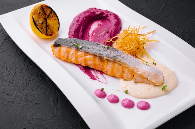 Salmon with beetroot puree and cream sauce
