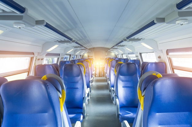 Salon inside of the speed commuter train with empty seats