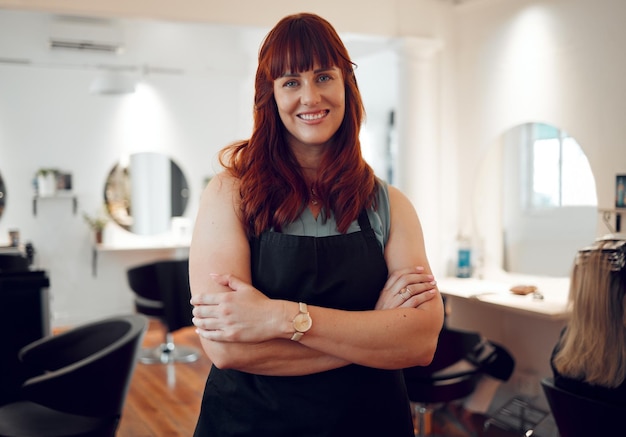 Salon woman and portrait of happy hairdresser with smile confidence or pride for work luxury hair care or spa service Designer hair stylist small business owner or hair salon worker in studio