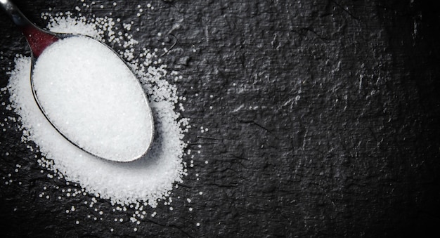 Salt background On a black table