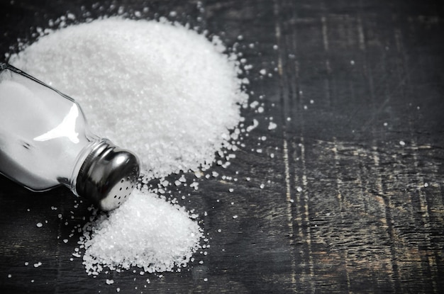 Salt background On a black table