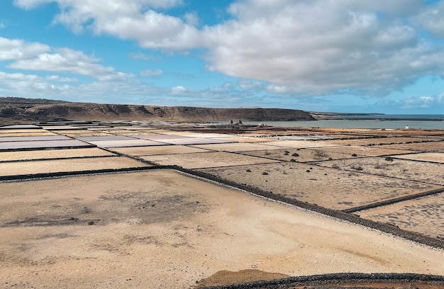 Salt flats on shore of sea