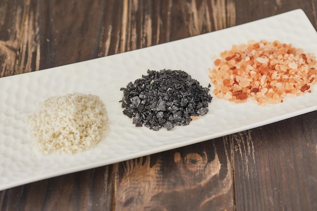 Salt flower Fleur de sel white red and black French salt on plate