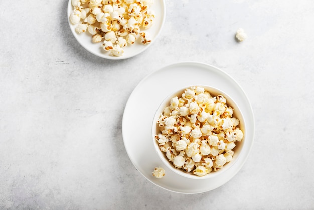 Salt popcorn in the light bowl