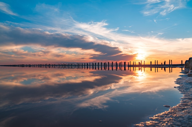 Photo salt sea water evaporation ponds with pink plankton colour