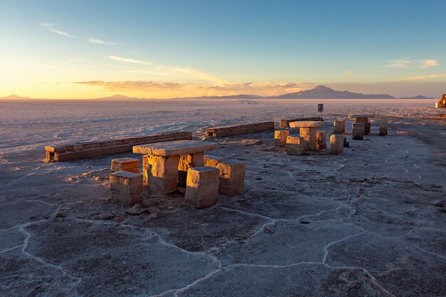 Salt tables with benches near Incahuasi cactus island  Uyuni Bolivia