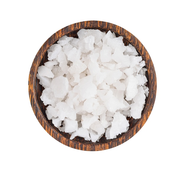 Salt in a wooden bowl isolated on white background